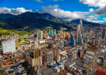 Bogota cityscape of big buildings and mountains and blue sky