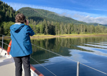 Watching grizzly and cubs from sailboat