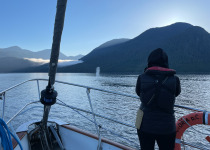 Watching whale blow from boat