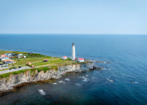 Aerial View of Cap-des-Rosiers Lighthouse, Gaspe Peninsula, Quebec, Canada during Summer.