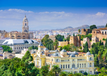 Malaga, Spain cityscape at the Cathedral, City Hall and Alcazaba citadel of Malaga.